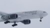 RUSSIA -- A Boeing 777 plane owned by Russia's Nordwind Airlines descends before landing and completing a direct flight from the Venezuelan capital of Caracas at Vnukovo International Airport outside Moscow, January 31, 2019