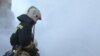 Tajikistan/Russia -- Russian fireman battle with a fire at house near Moscow,while five tajik migrant death, 5 January 2014